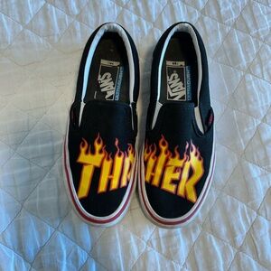 Vans Black and Yellow Flame Slip-On Sneakers